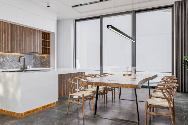 istock A simple and classic wooden dining setup with a white countertop and stools and panoramic window 2157251642