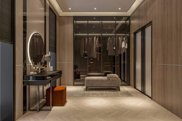 istock A modern walk-in closet with black and brown cabinets and a vanity with led light mirror in the bedroom 2157251690