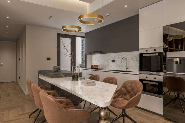 istock Spacious modern open kitchen with white island and stainless steel appliances next to the dining table 2157252285