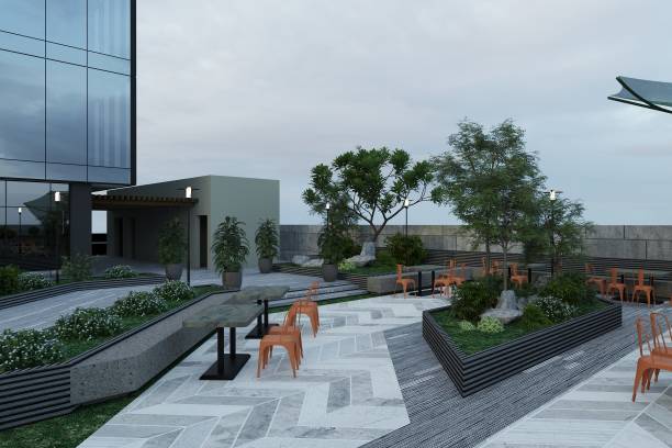 istock A modern rooftop terrace with tables, chairs, and plants. 2157252379