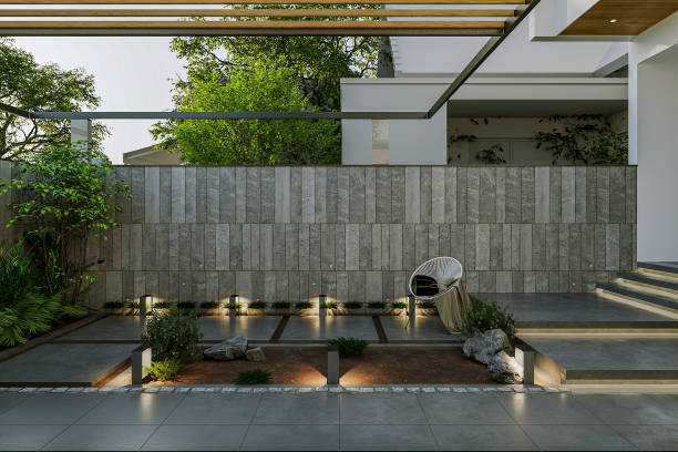 istock A modern house with a garden and a stone wall, exteriro design with creative concepts 2157253464