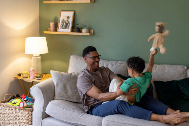 istock Father and Son Playing at Home 2157253538