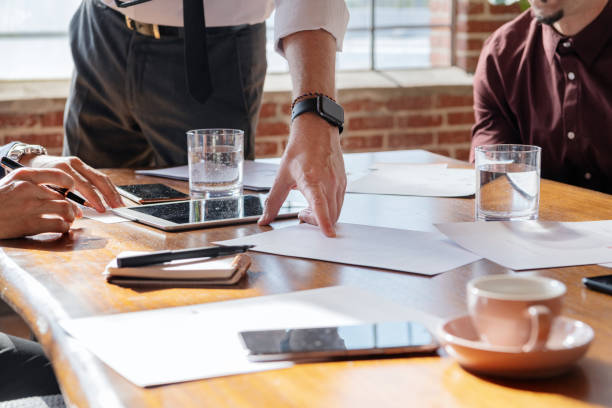 istock Businesspeople brainstorming in a meeting 2157254241