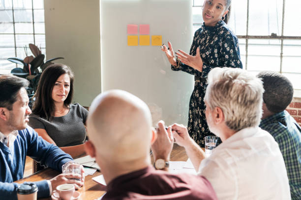 istock Businesspeople brainstorming in a meeting 2157254267