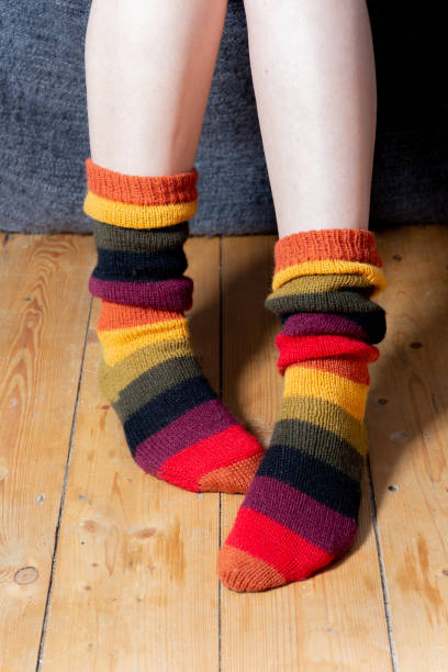 istock Sexy Female Legs with Colored Socks 2157255407