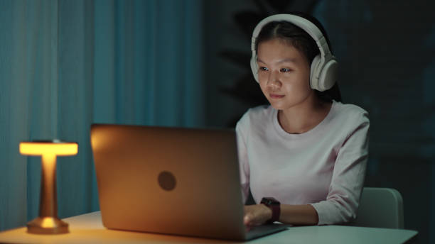 istock Teenage girl using laptop. 2157256356
