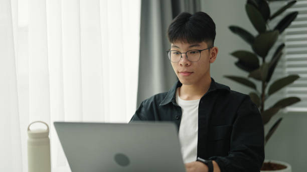istock Teenager student working on laptop. 2157256816