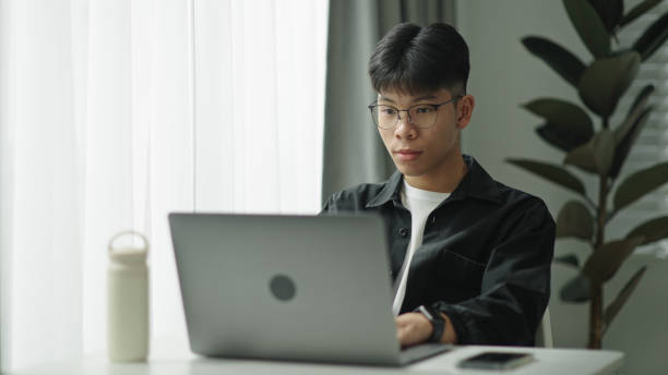 istock Teenager student working on laptop. 2157256829