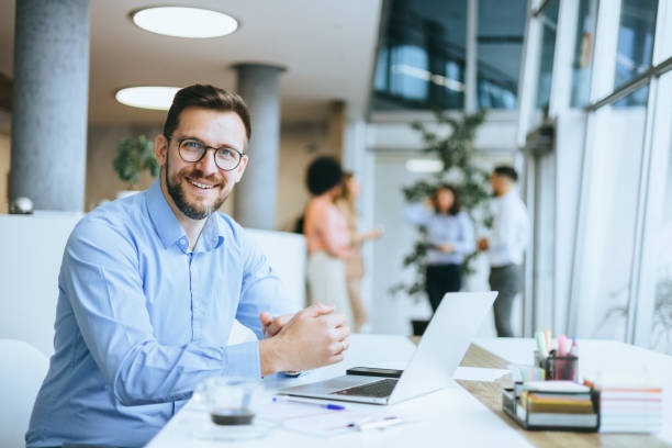 istock Focused male executive working at laptop 2157262215