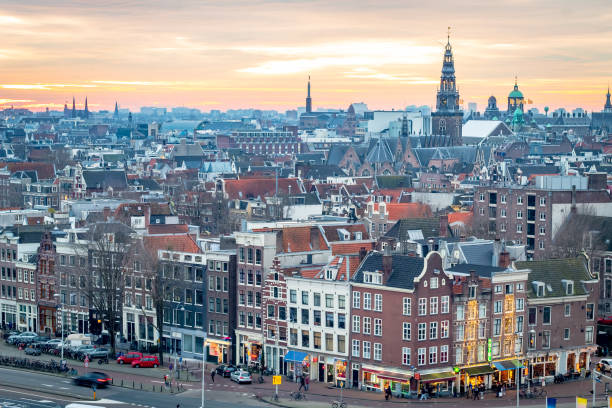 istock Golden sunset behind the Amsterdam skyline 2157262302