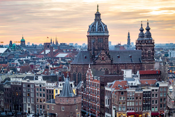 istock Golden sunset behind the Amsterdam skyline 2157262315