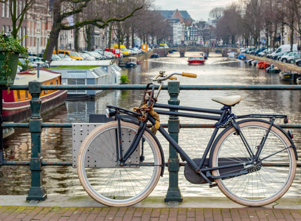 istock Bicycle parked along the building lined canals in Amsterdam. 2157262324