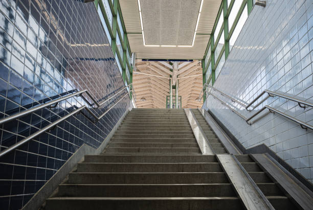 pedestrian stairs from the underpass to the train station, urban life