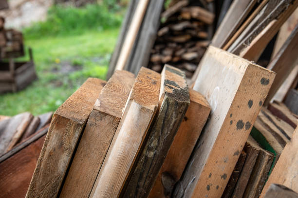 Remnants of old boards, timber waste and building materials