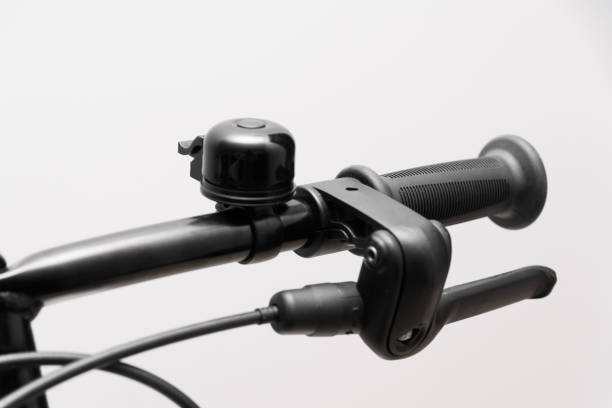 istock Bicycle handlebar close-up, with brake levers and bell 2157267174