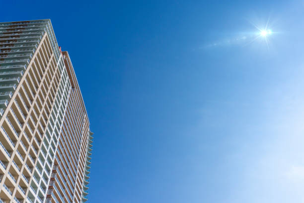 Exterior of high-rise condominium and refreshing blue sky scenery