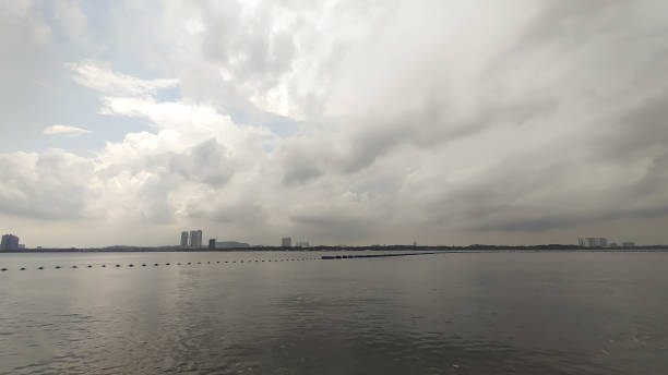 istock building structures far away across the sea 2157275593