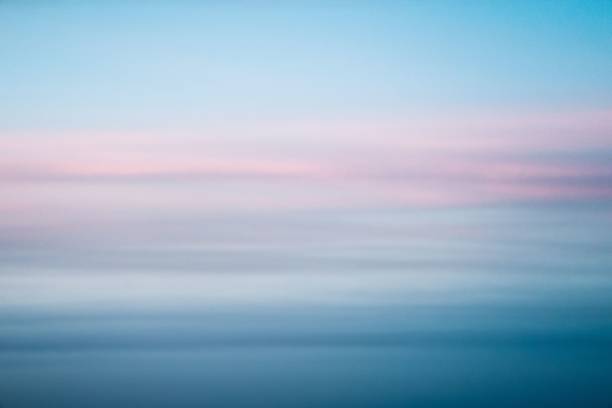istock Serene sky with pastel pink and blue hues creating a calming gradient effect. 2157276926