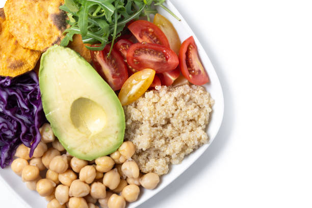 istock Healthy salad with avocado,lettuce,tomato and chickpeas isolated on white background 2157279722