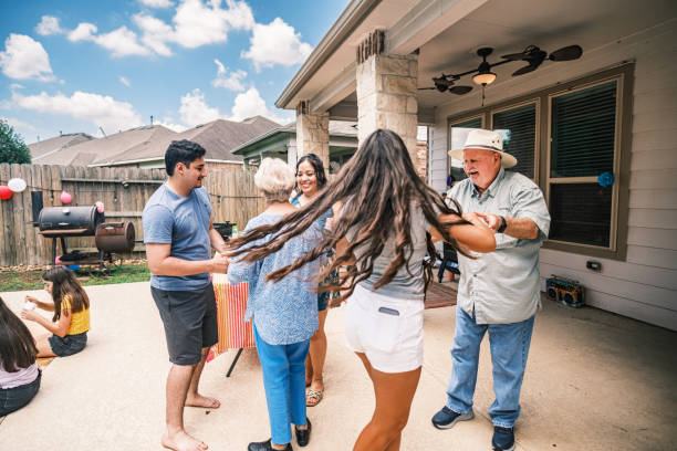 istock Multi generation Latino family dancing at the backyard party 2157280106