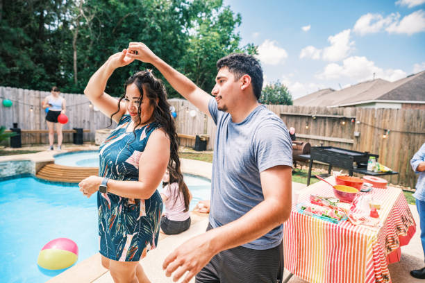 istock Multi generation Latino family dancing at the backyard party 2157280211