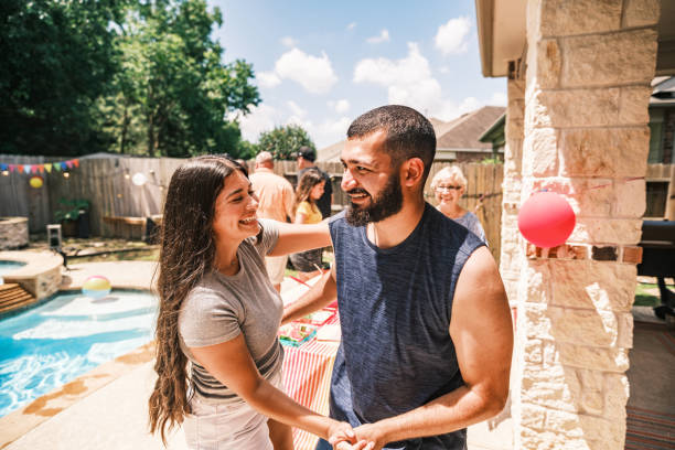 istock Multi generation Latino family dancing at the backyard party 2157280233
