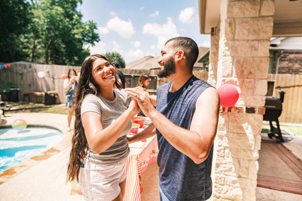 istock Multi generation Latino family dancing at the backyard party 2157280238