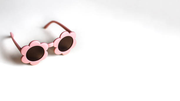 istock Baby sunglasses on beige background with copy space 2157280523