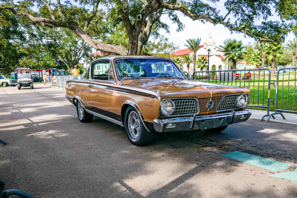 Gulfport, MS - October 07, 2023: High perspective front corner view of a 1966 Plymouth Barracuda Hardtop Coupe at a local car show.