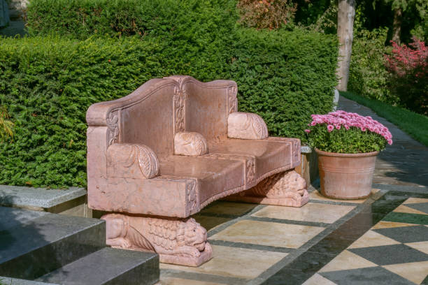 istock Park bench made of pink marble. 2157295159