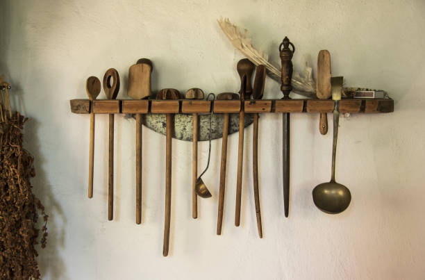 istock a wooden shelf with old hanging kitchenware 2157298212