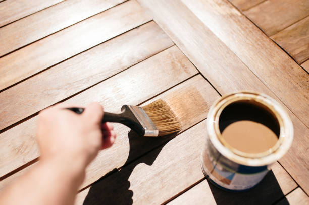 istock Varnishing a wooden table 2157299093