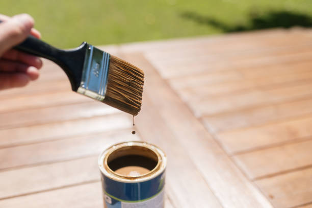 istock Varnishing a wooden table 2157299126