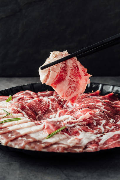 istock Wagyu beef slices on black background 2157299273