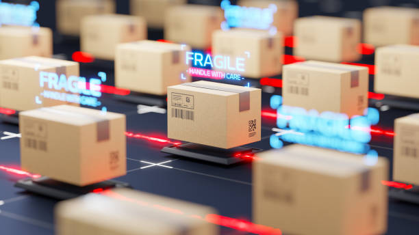 istock Automatic logistics management concept. Cardboard boxes on abstract futuristic product line with holographic labels “Fragile” 2157299487