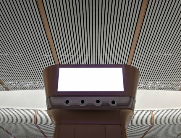 Blank advertising screens are pointed at people