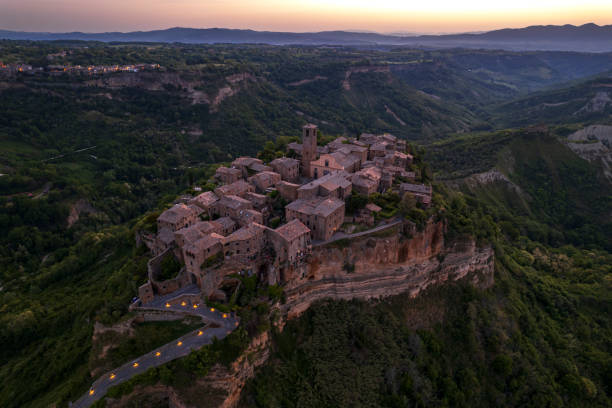 CIVITA DI BAGNOREGIO, VITERBO, LAZIO, ITALY - October 1, 2018: View of the medieval village among the most beautiful in Italy, which stands on a tufa hill in the valley of the calanchi, called \