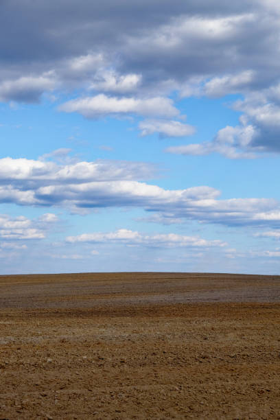 istock A clear day over freshly tilled agricultural land. 2157302762