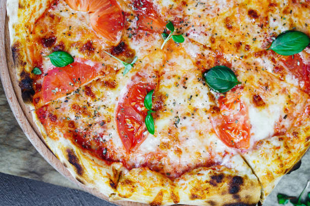 istock A delicious slice of margherita pizza with fresh mozzarella 2157304093