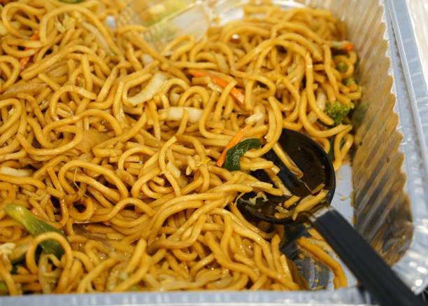 istock fried noodle in the aluminum container 2157308052