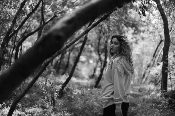istock woman spending time in the forest 2157308593