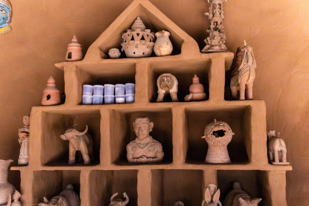 Mysuru, Karnataka, India-September 25 2024; Miniature realist burnt clay Toys and Dolls in vibrant colors made by the traditional Krishnanagar tribal artists in West Bengal, India.