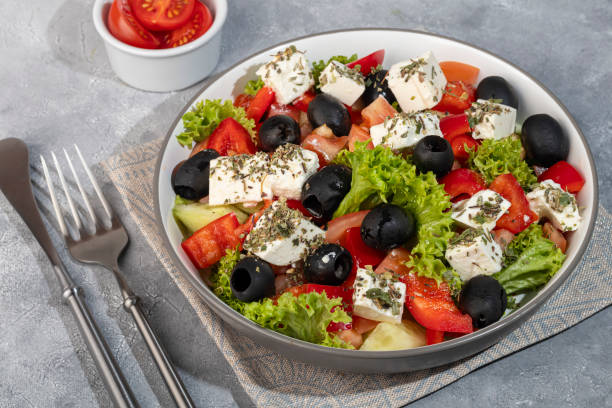 istock Salad with cucumbers and arugula, shrimp and cherry tomatoes in a light sauce. Copy space 2157315772