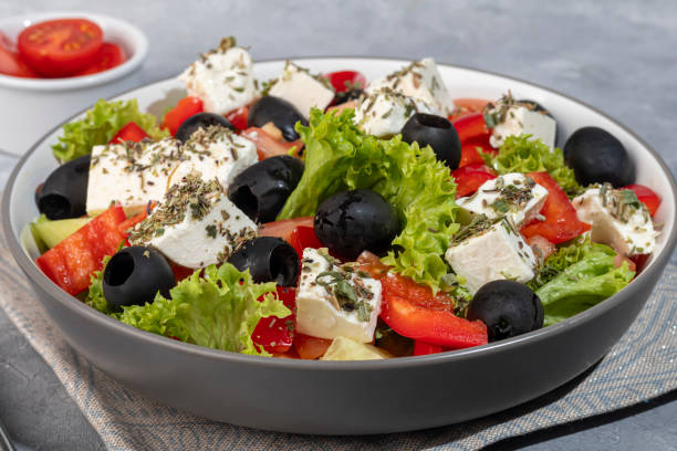 istock Salad with cucumbers and arugula, shrimp and cherry tomatoes in a light sauce. Copy space 2157319633