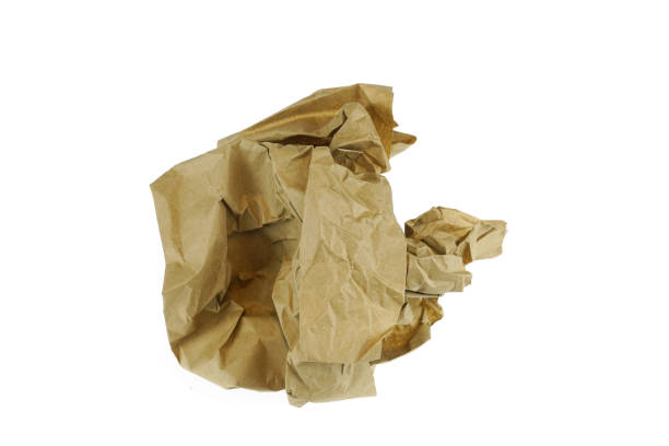 istock crumpled brown paper isolated on white background 2157332200