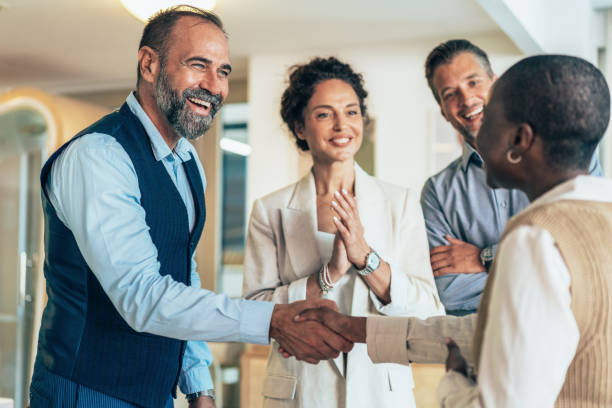 istock Business people shaking hands in the office 2157332219