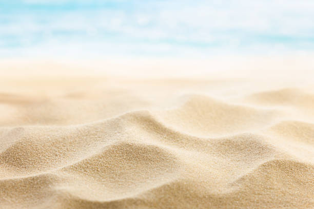 istock background of beach sand and sea 2157336044