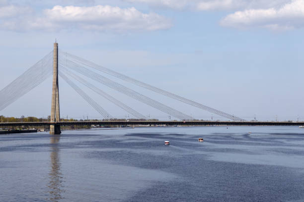 istock .reinforced concrete bridge with metal wires over the river 2157337513