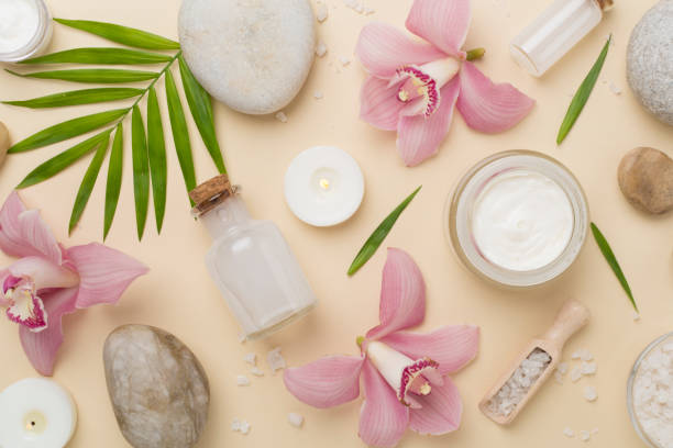 istock Composition with orchids, spa products on color background, top view 2157338965