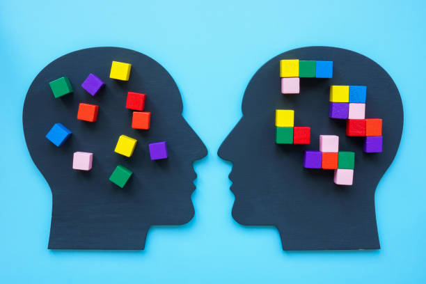 istock Two heads with and without cubes in structure as a concept of mentoring and training. 2157339891